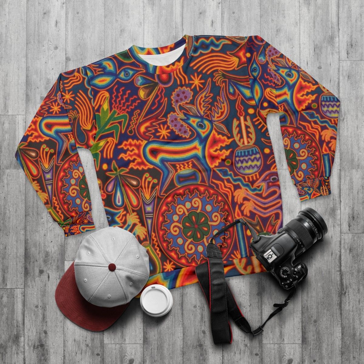 Huichol Sweatshirt with Vibrant Abstract Art Design - flat lay