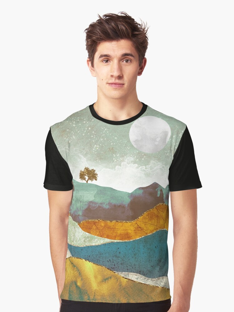 A graphic t-shirt featuring a stunning night fog landscape with a celestial atmosphere of stars, moon, and clouds. - Men