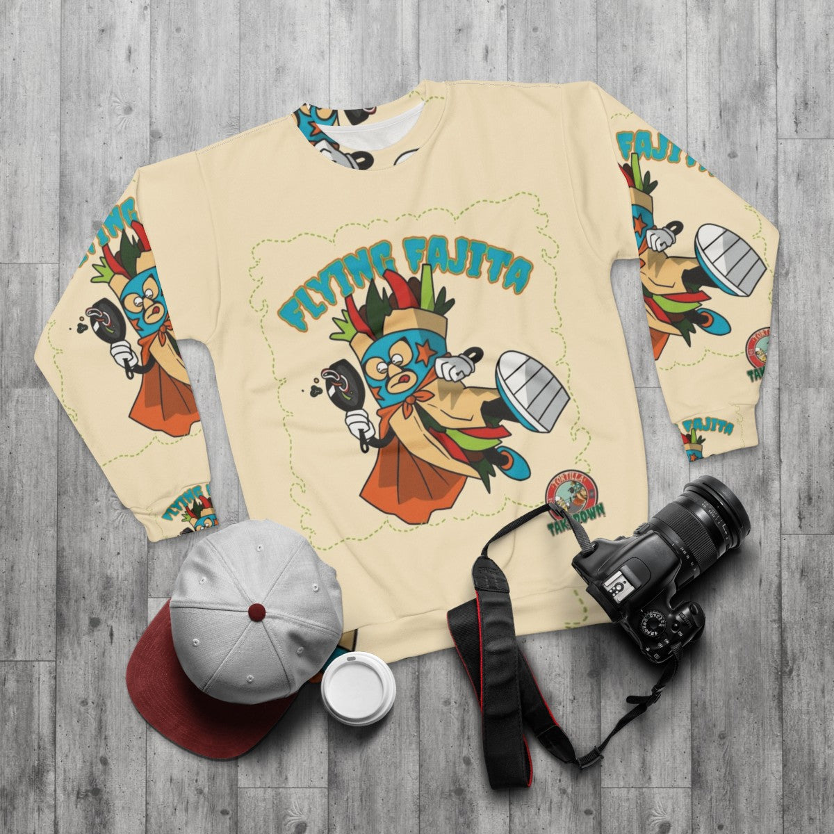 Mexican wrestling sweatshirt with tortilla takedown design - flat lay