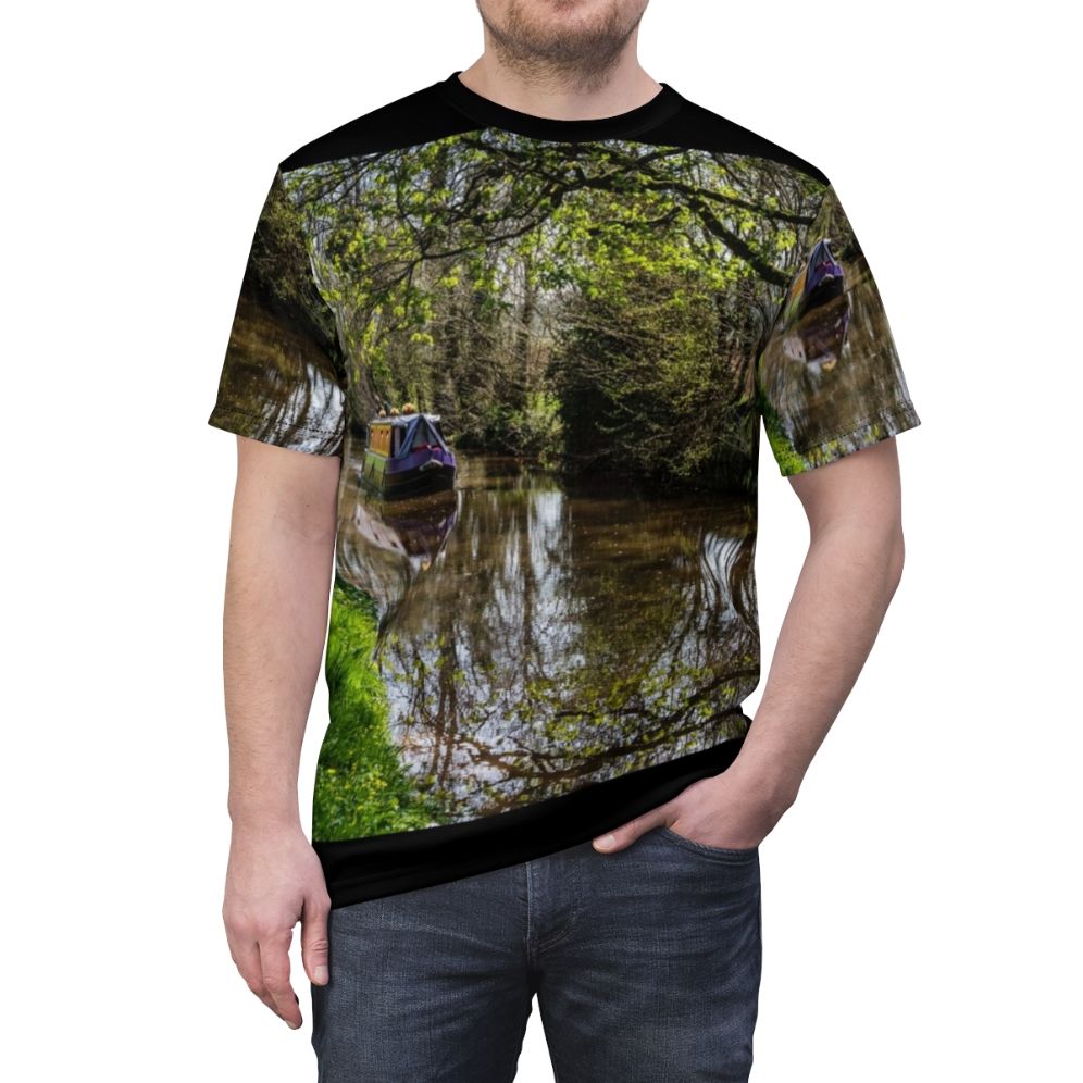 Photograph of a canal barge reflected in the peaceful waters of a scenic Welsh waterway. - men front