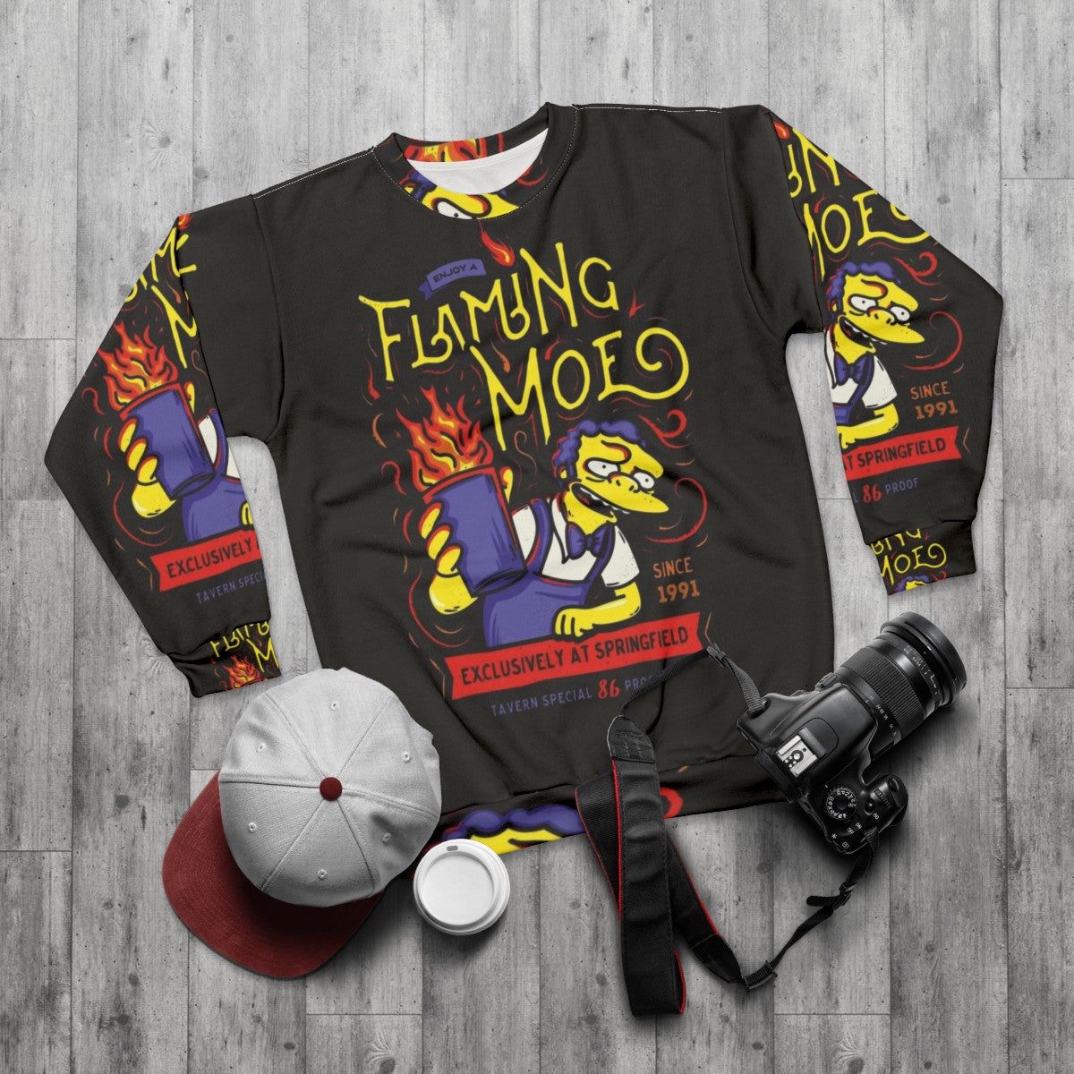 Flaming drink sweatshirt with classic cartoon design from Springfield tavern - flat lay