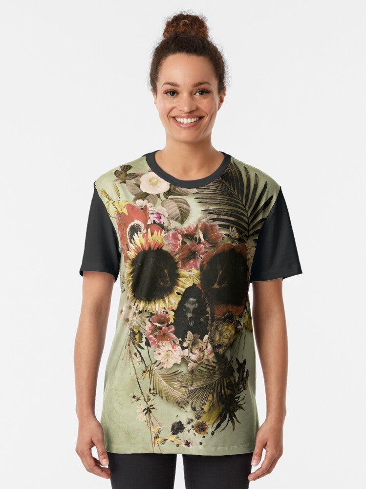 A graphic t-shirt featuring a floral skull design with a garden-inspired aesthetic. - Women