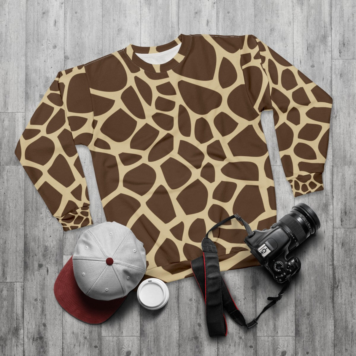 Giraffe pattern sweatshirt with camouflage design - flat lay