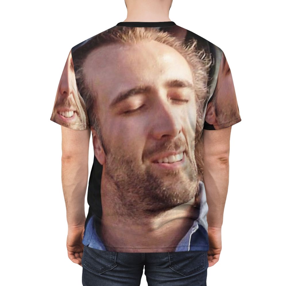 Stylized portrait graphic of famous actor Nicolas Cage on a t-shirt - men back