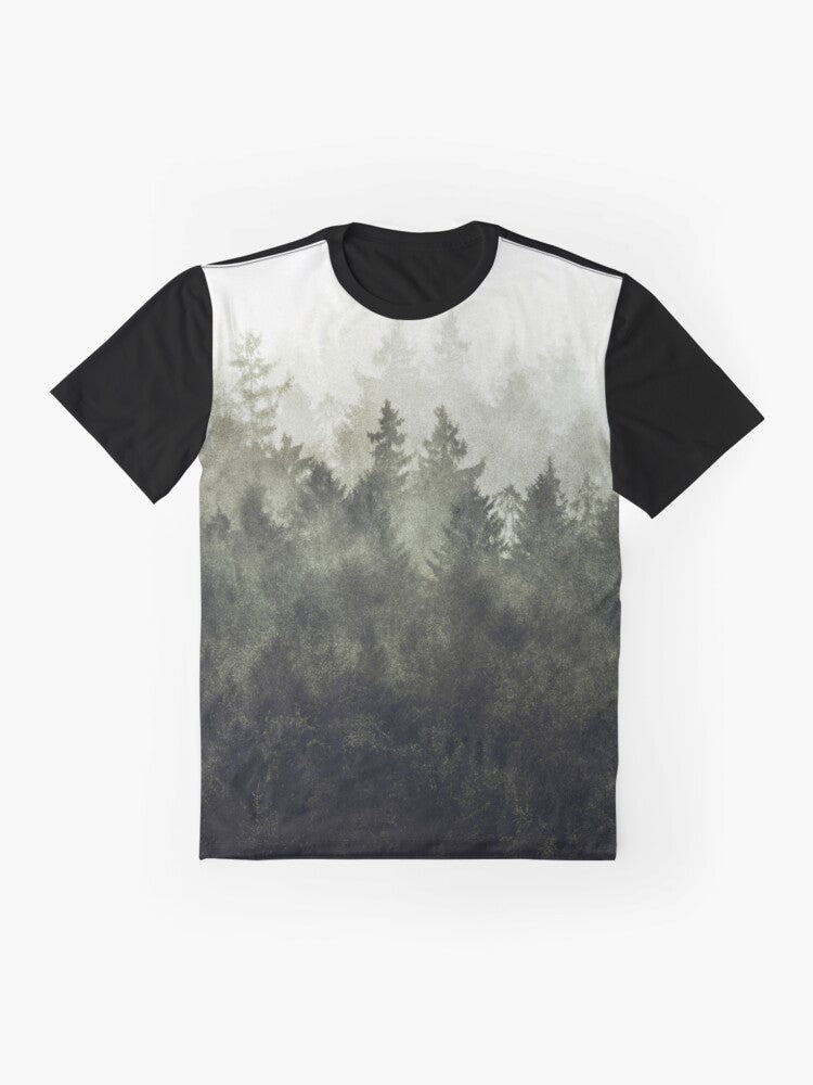 A green graphic t-shirt featuring a vintage-style illustration of a foggy, misty mountain landscape. - Flat lay