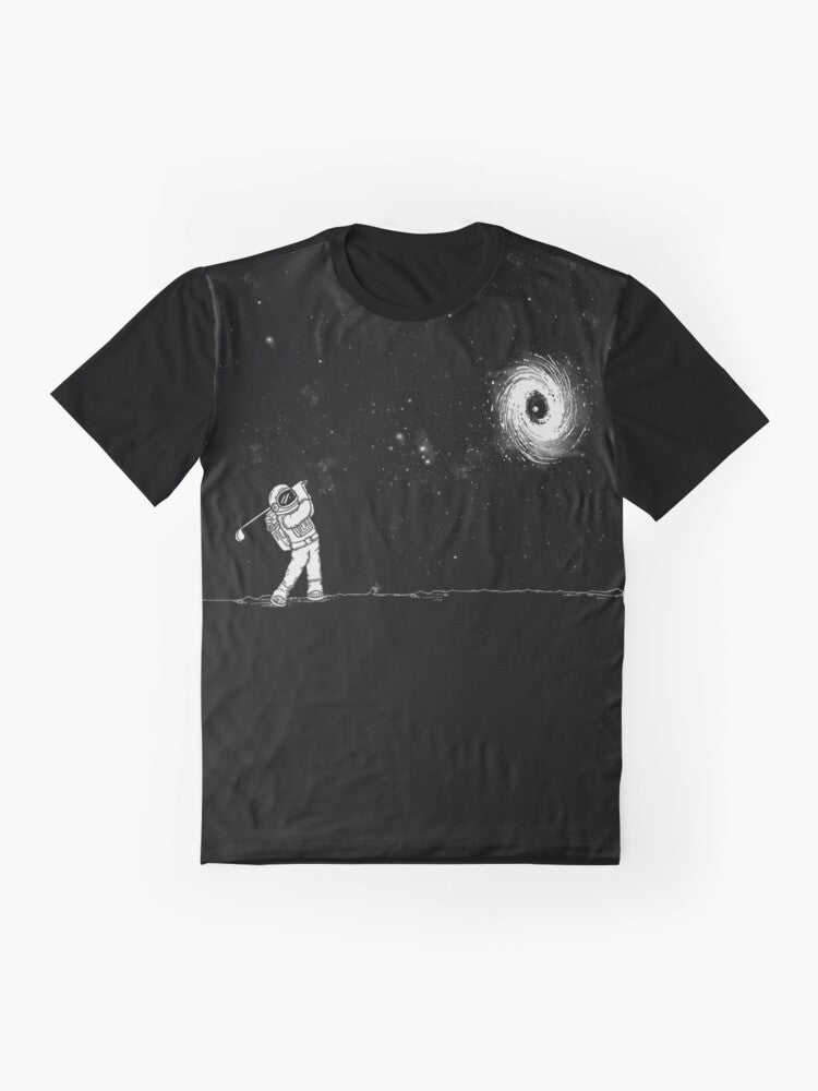 A graphic t-shirt featuring a black hole in one golf design, against a space and star-filled background. - Flat lay