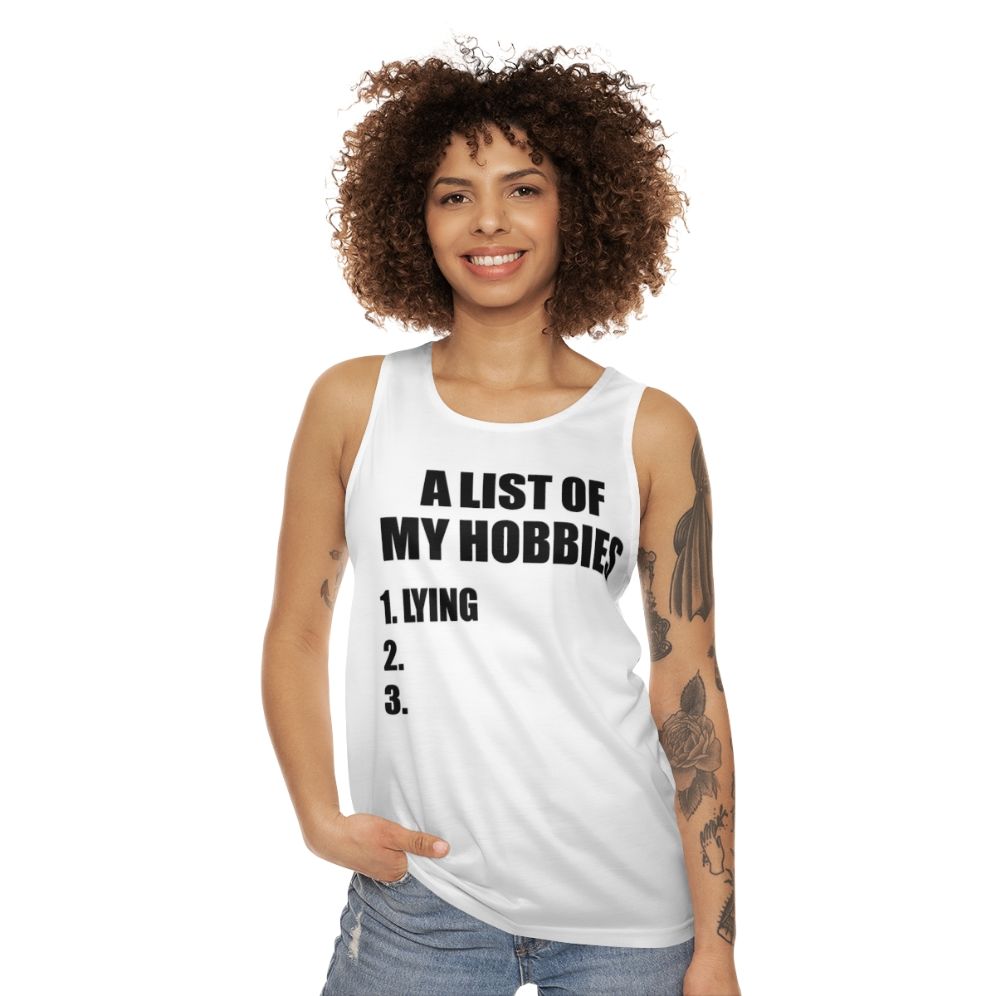 Unisex tank top with "A List of My Hobbies Lying" design - women