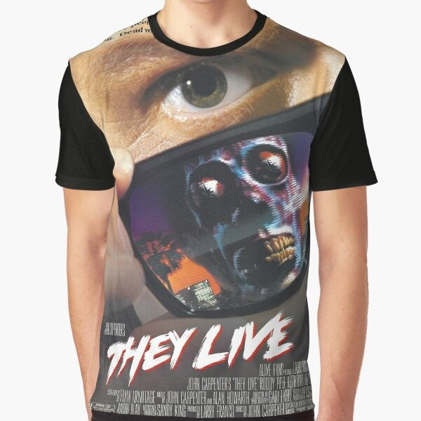 They Live! Sci-Fi Graphic T-Shirt featuring a retro movie poster style design with aliens and human figures