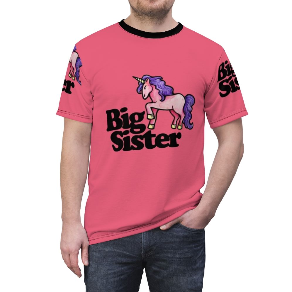 A whimsical t-shirt featuring a cute big sister design with a unicorn and other magical creatures. - men front