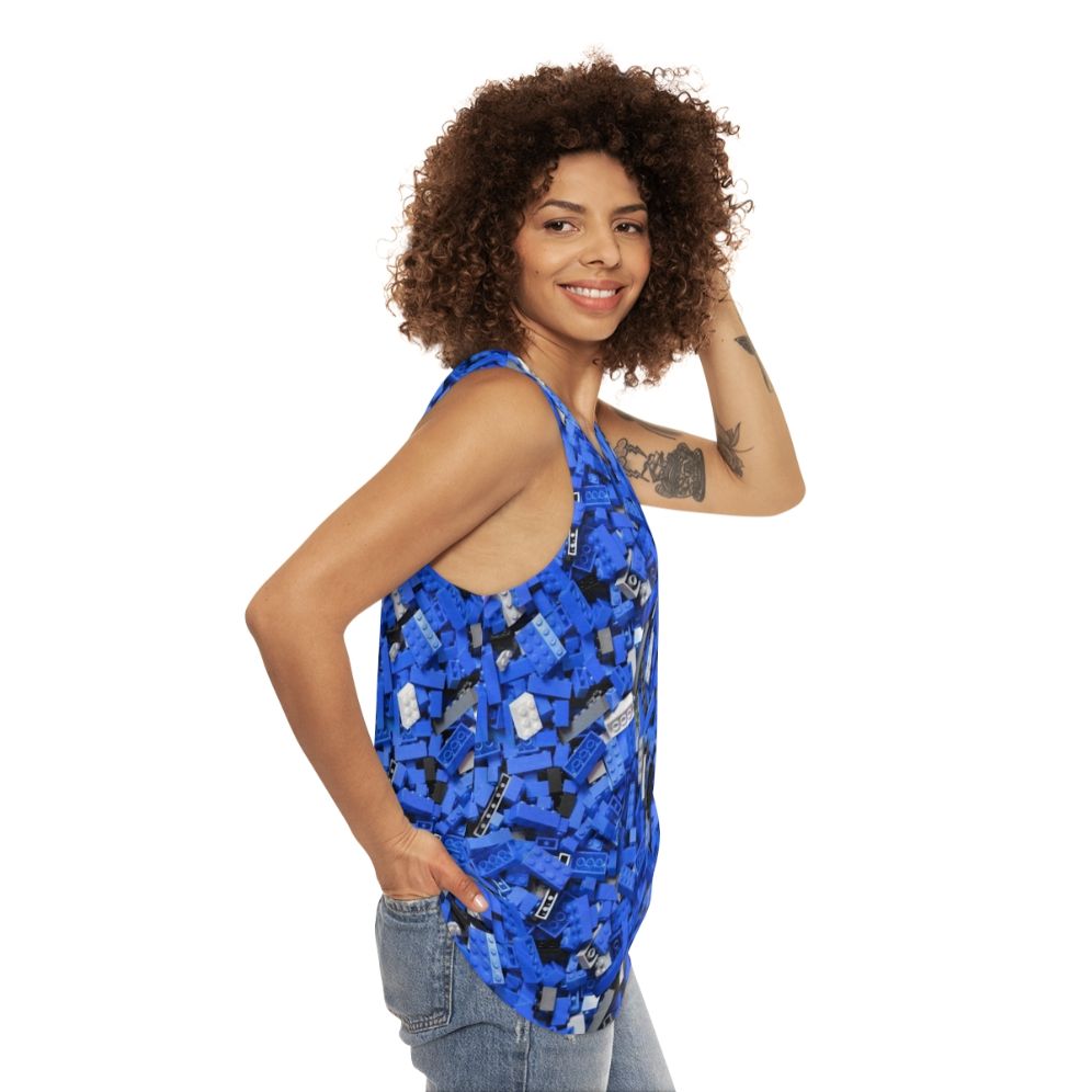 Blue unisex tank top with a repeating bricks/lego-inspired pattern - women side