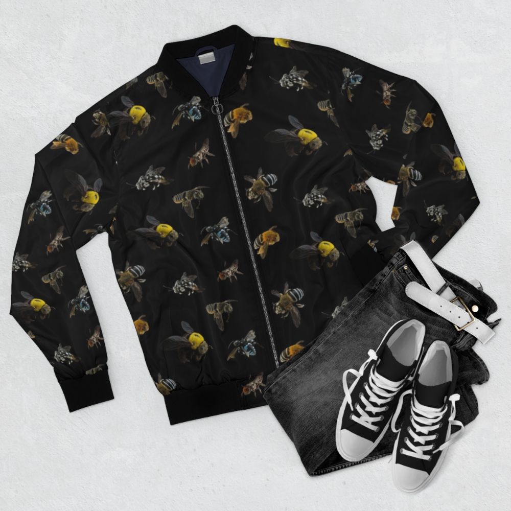 Native Australian bees bomber jacket featuring a detailed insect pattern design - Flat lay