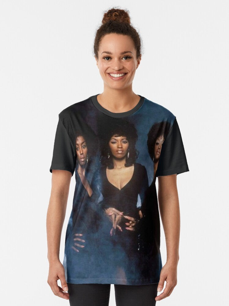 Vintage graphic t-shirt featuring the iconic 1970s soul group, The Three Degrees - Women