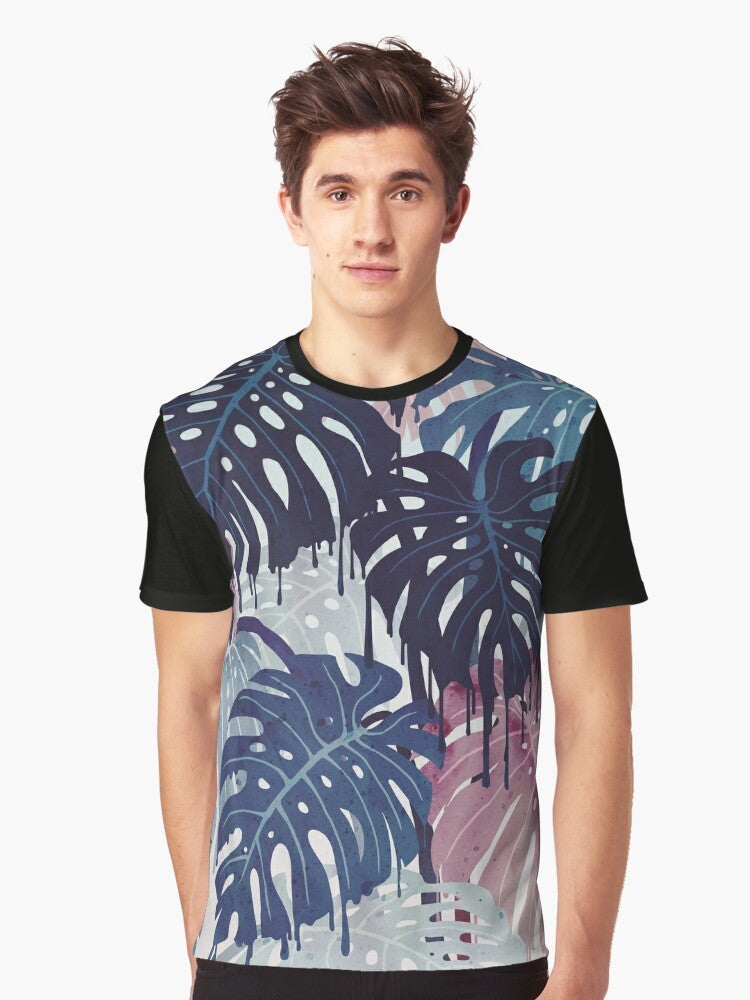 Monstera Melt Graphic T-Shirt featuring a surreal, melting tropical leaf design in blue and pink - Men