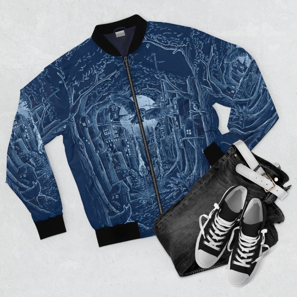 Midnight City Bomber Jacket featuring a nature-inspired design with a city skyline, moon, and forest animals. - Flat lay