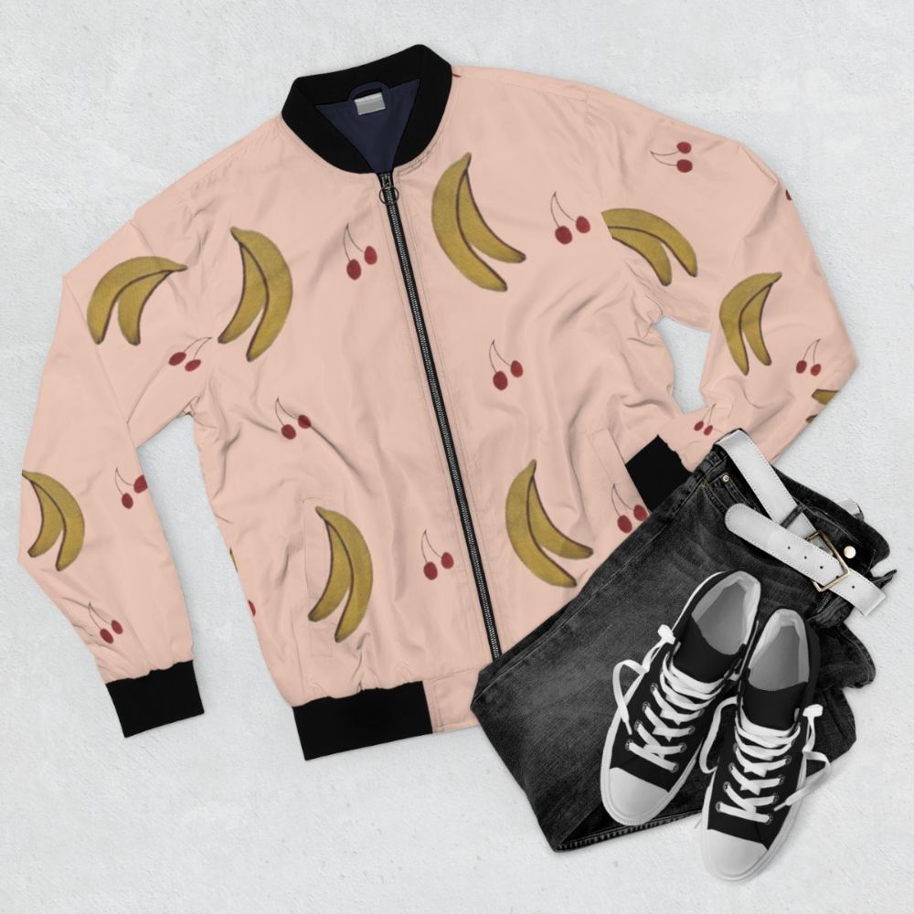 French Canadian-inspired women's bomber jacket in pink pattern - Flat lay