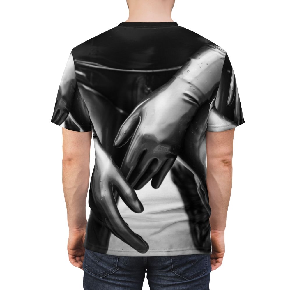 A black and white t-shirt design featuring a close-up of latex gloves with a shallow depth of field, creating an artsy and stylized look. - men back