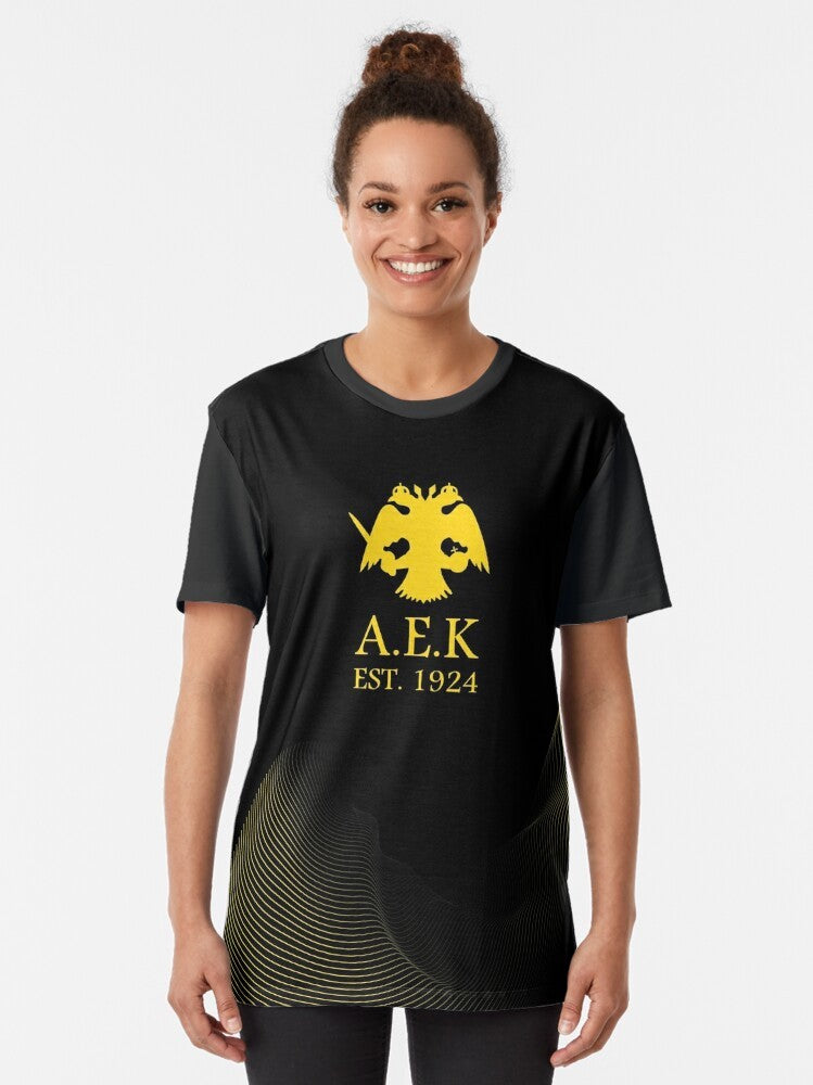 AEK ATHENS Graphic T-Shirt with focus on the AEK Athens logo and team name - Women