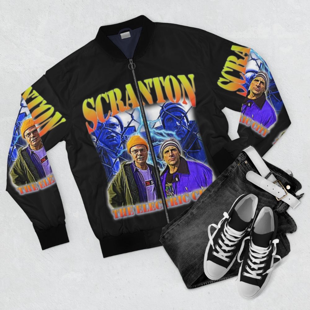 Vintage-inspired bomber jacket with "The Electric City" and "Scranton" graphics, inspired by The Office TV show. - Flat lay