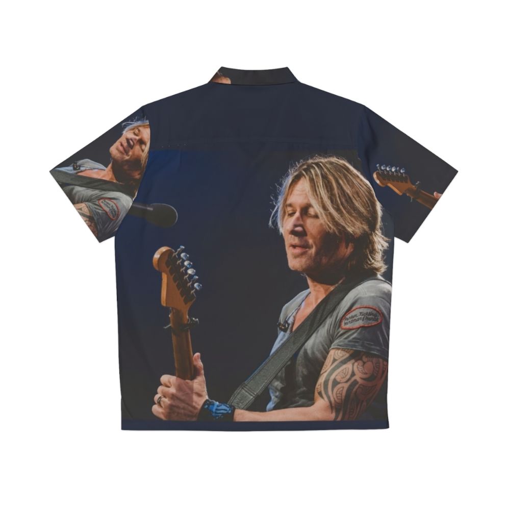 Keith Urban wearing a colorful Hawaiian shirt at a concert - Back