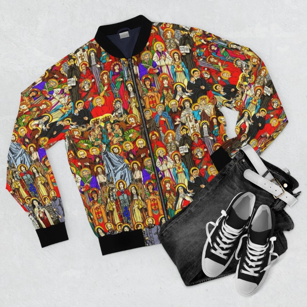 Blessed Saints Bomber Jacket featuring Catholic saints and religious imagery - Flat lay