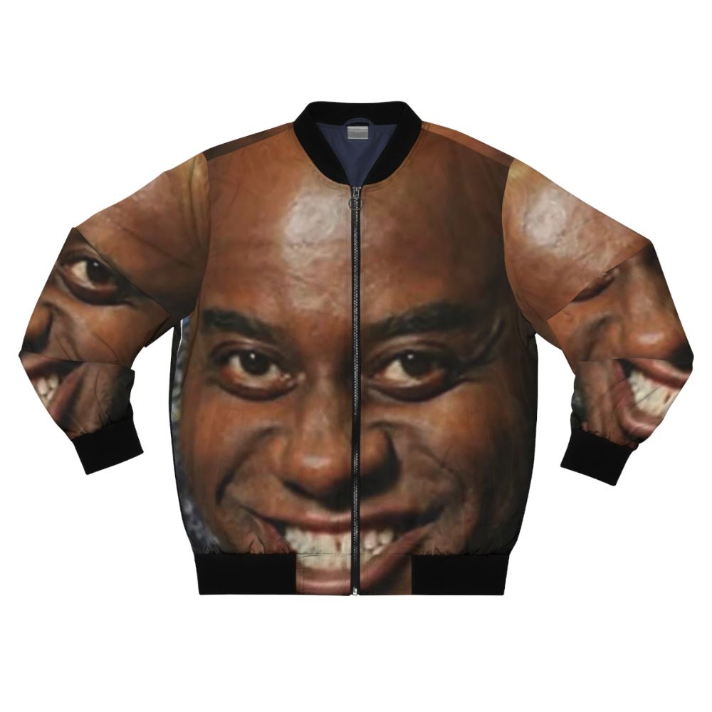 Ainsley Harriott wearing a large, greasy bomber jacket with a spicy rub for your meat