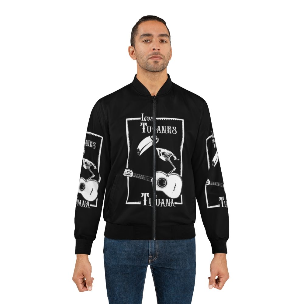 Los Tucanes de Tijuana heavy metal-inspired bomber jacket featuring a skeleton design - Lifestyle