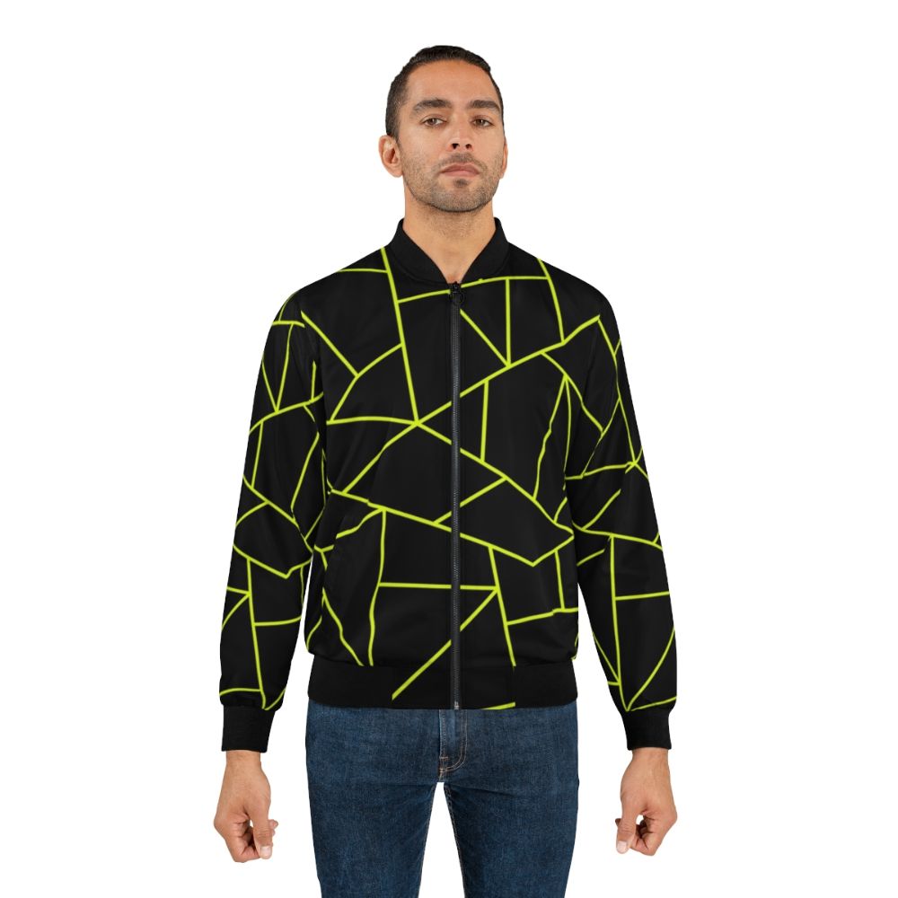 Chartreuse yellow and black bomber jacket with a unique geometric pattern design - Lifestyle