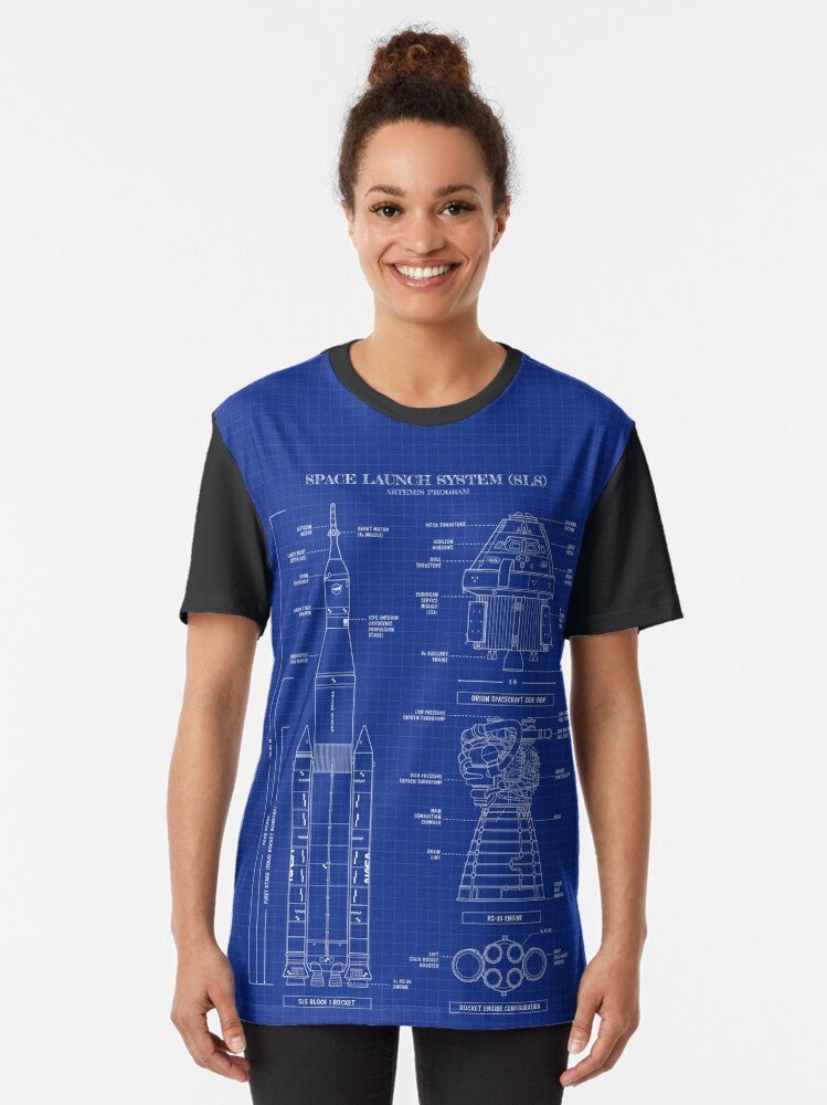 NASA Artemis SLS Rocket Graphic T-Shirt featuring a blueprint-style vertical design of the Space Launch System rocket. - Women