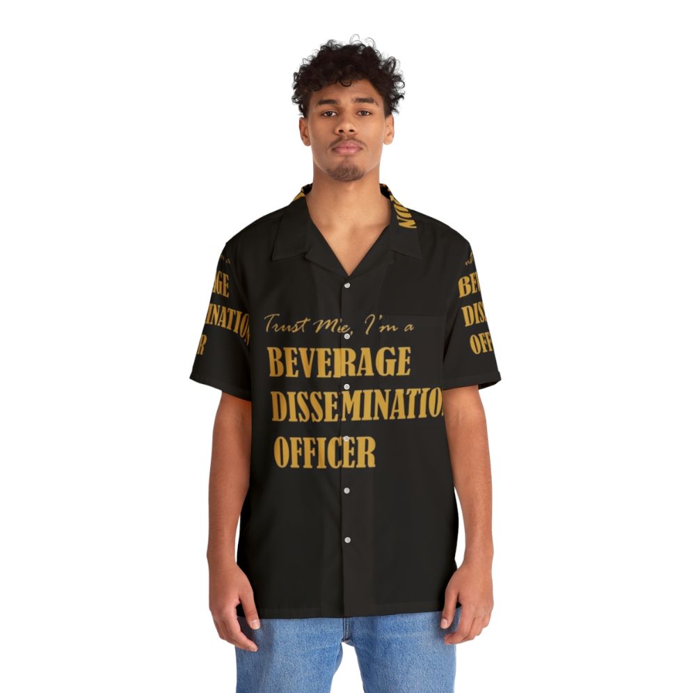 Bartender wearing a Hawaiian shirt with "Beverage Dissemination Officer" text - People Front