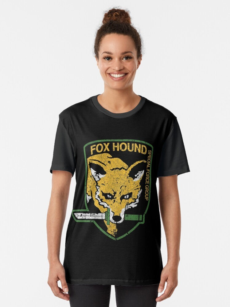 Metal Gear Solid Foxhound Graphic T-Shirt featuring the iconic Foxhound logo and characters from the video game series - Women