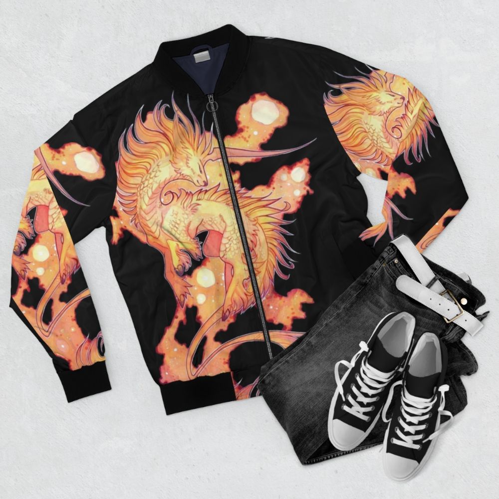 Space unicorn fantasy bomber jacket with vibrant red and orange colors - Flat lay