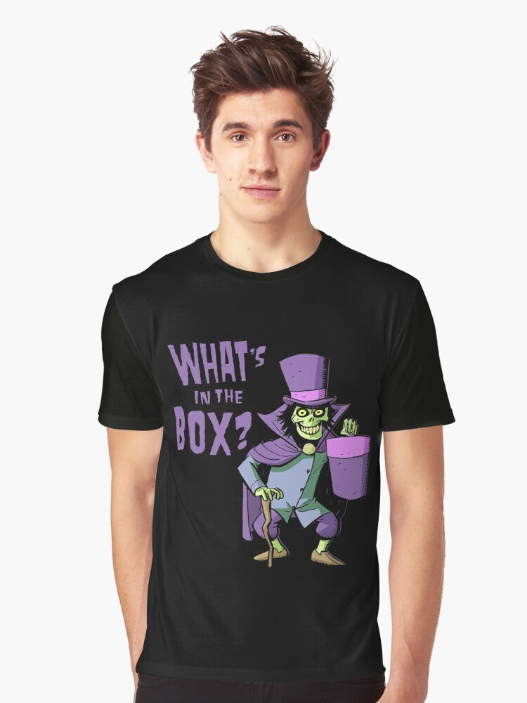 A graphic t-shirt design featuring a haunted mansion and a mysterious hatbox, with spooky and creepy elements. - Men