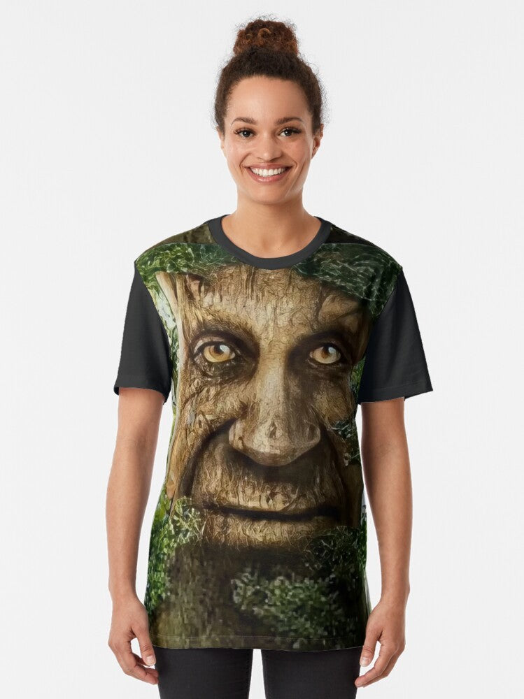 A graphic t-shirt featuring a wise, mystical tree meme design. - Women