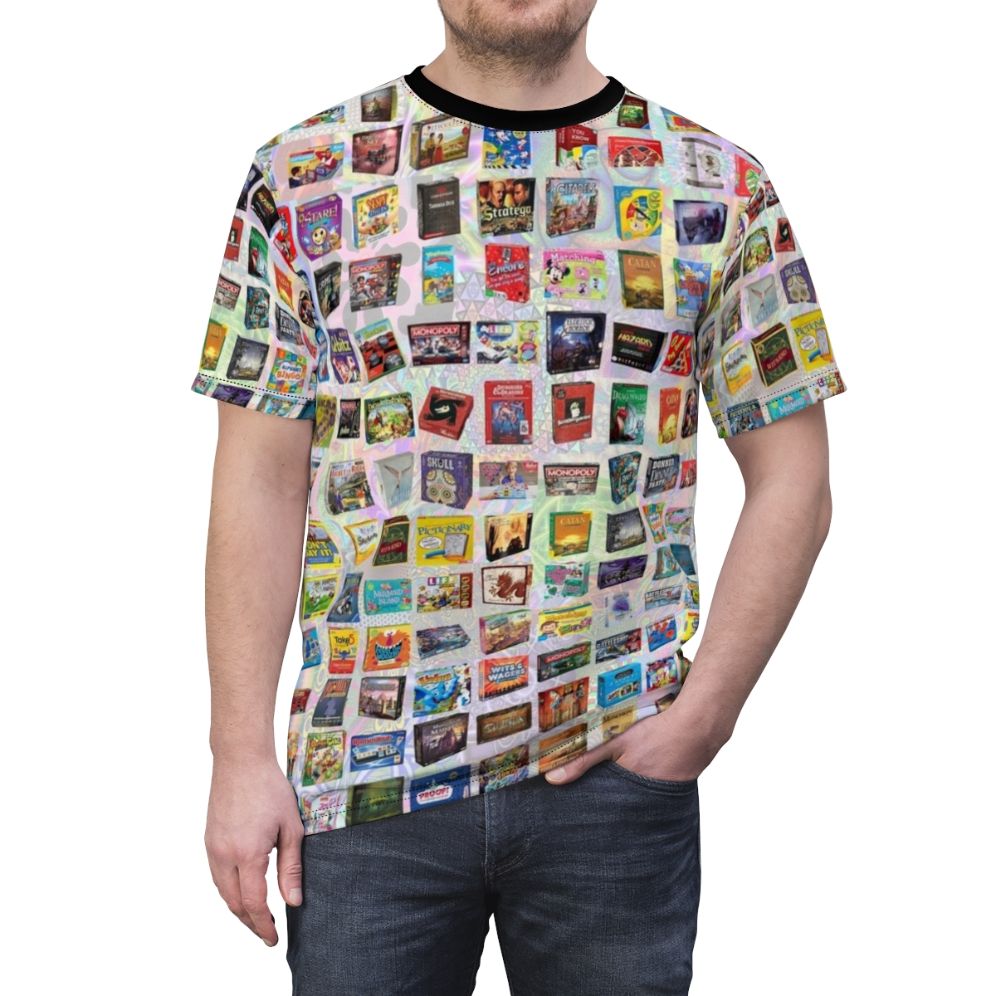 Model wearing a t-shirt featuring an all-over print design with various board game pieces and elements. - men front