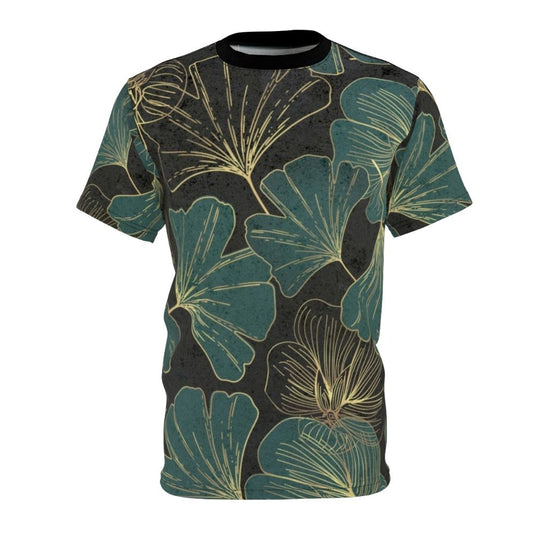 Model wearing a t-shirt featuring an artistic design of ginkgo biloba leaves in shades of green and yellow.