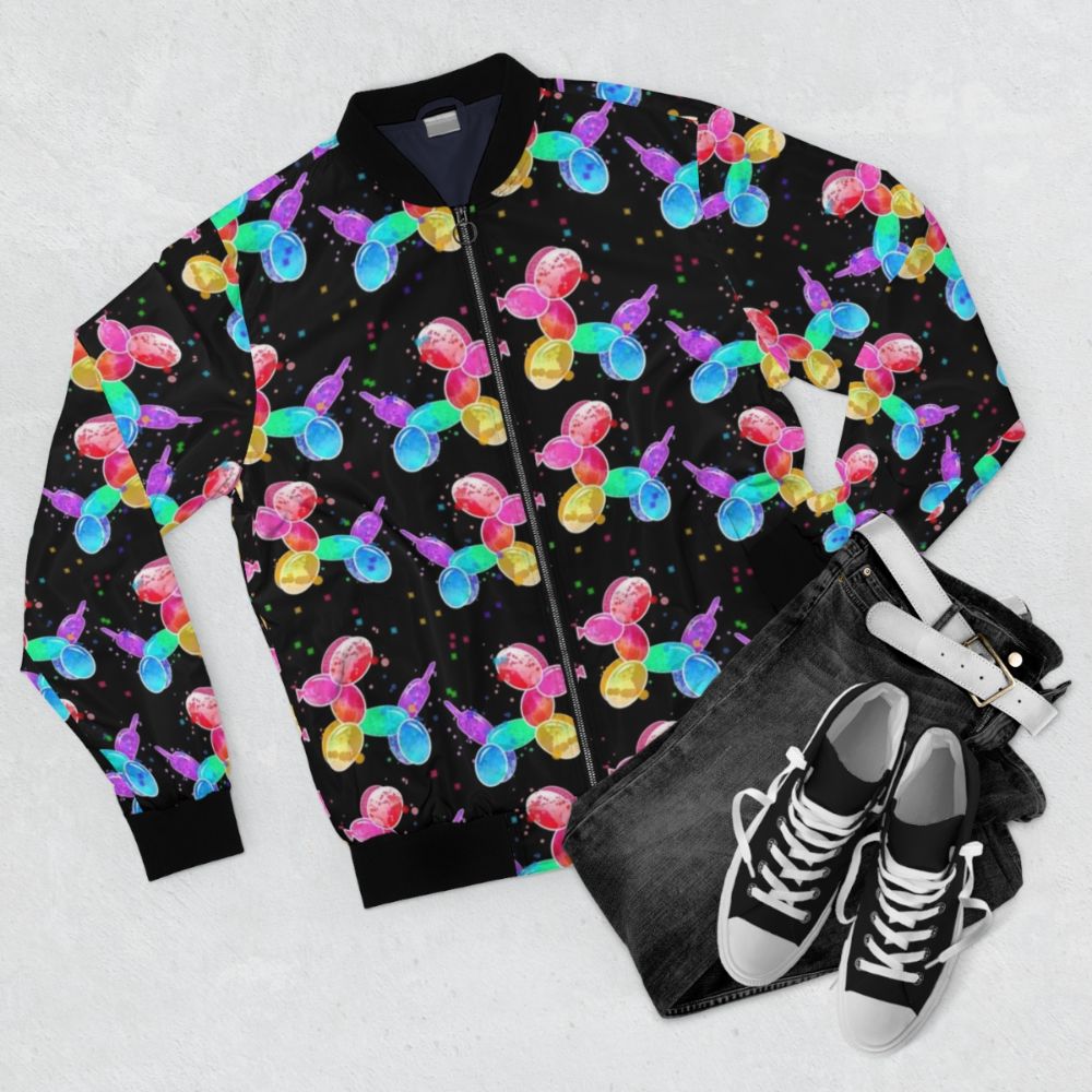 Watercolor design of balloon dogs on a black bomber jacket - Flat lay