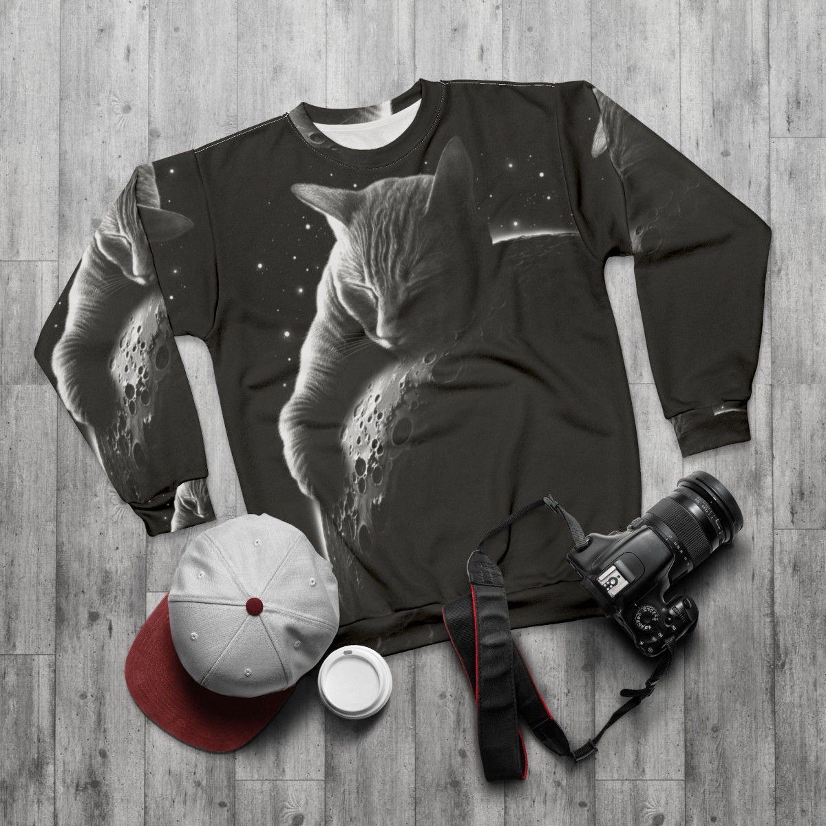 Mooncat Sweatshirt featuring a cat in a space suit against a starry night sky - flat lay