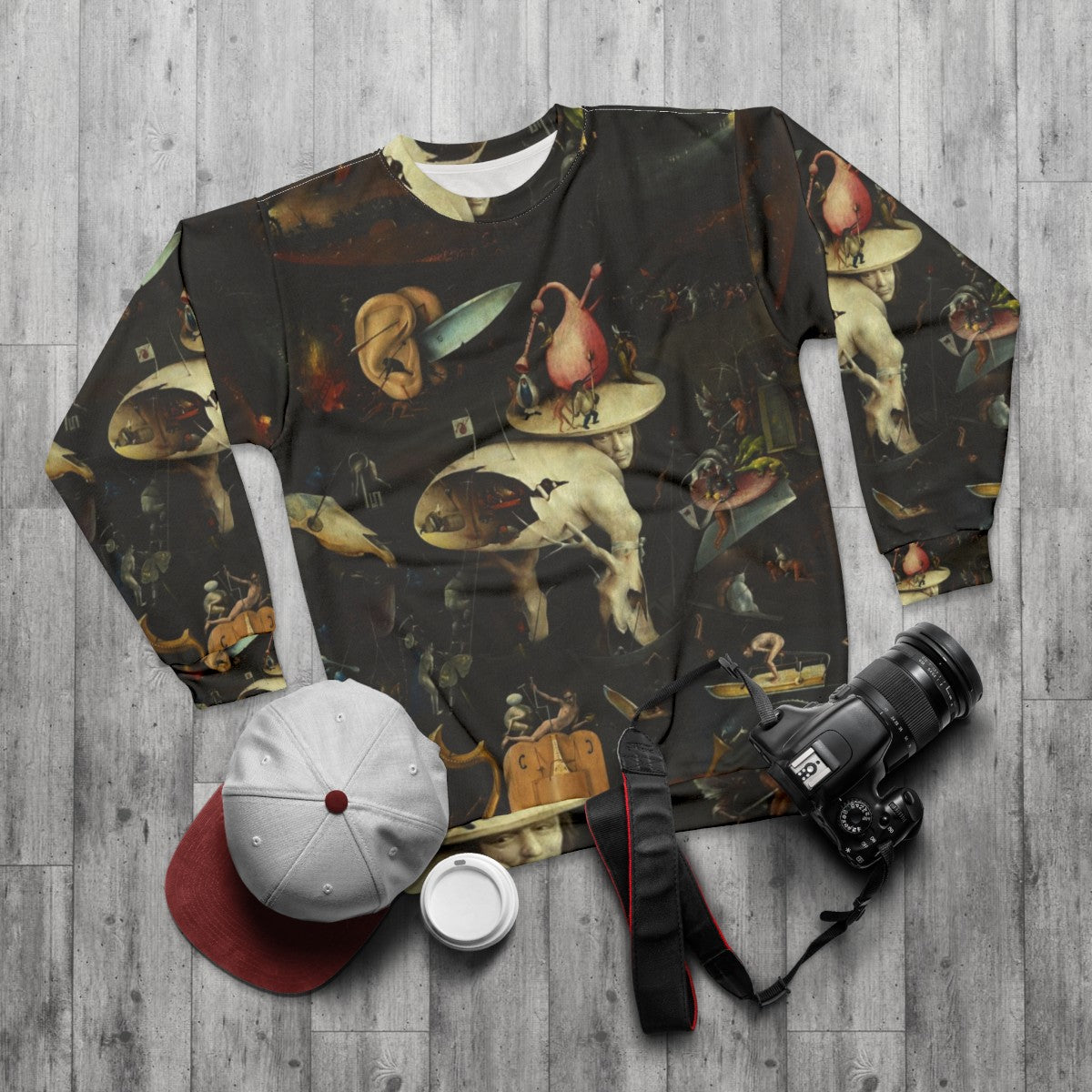 Hieronymus Bosch inspired sweatshirt featuring surreal "Hell" scene - flat lay