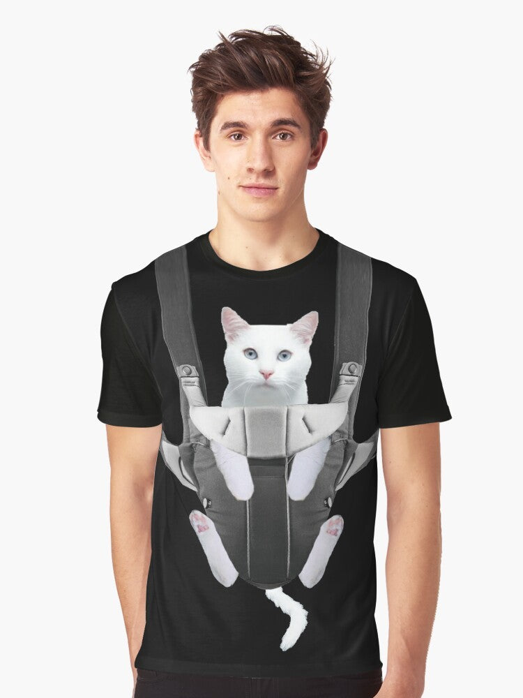 Adorable tabby cat snuggled in a baby carrier on a graphic t-shirt - Men