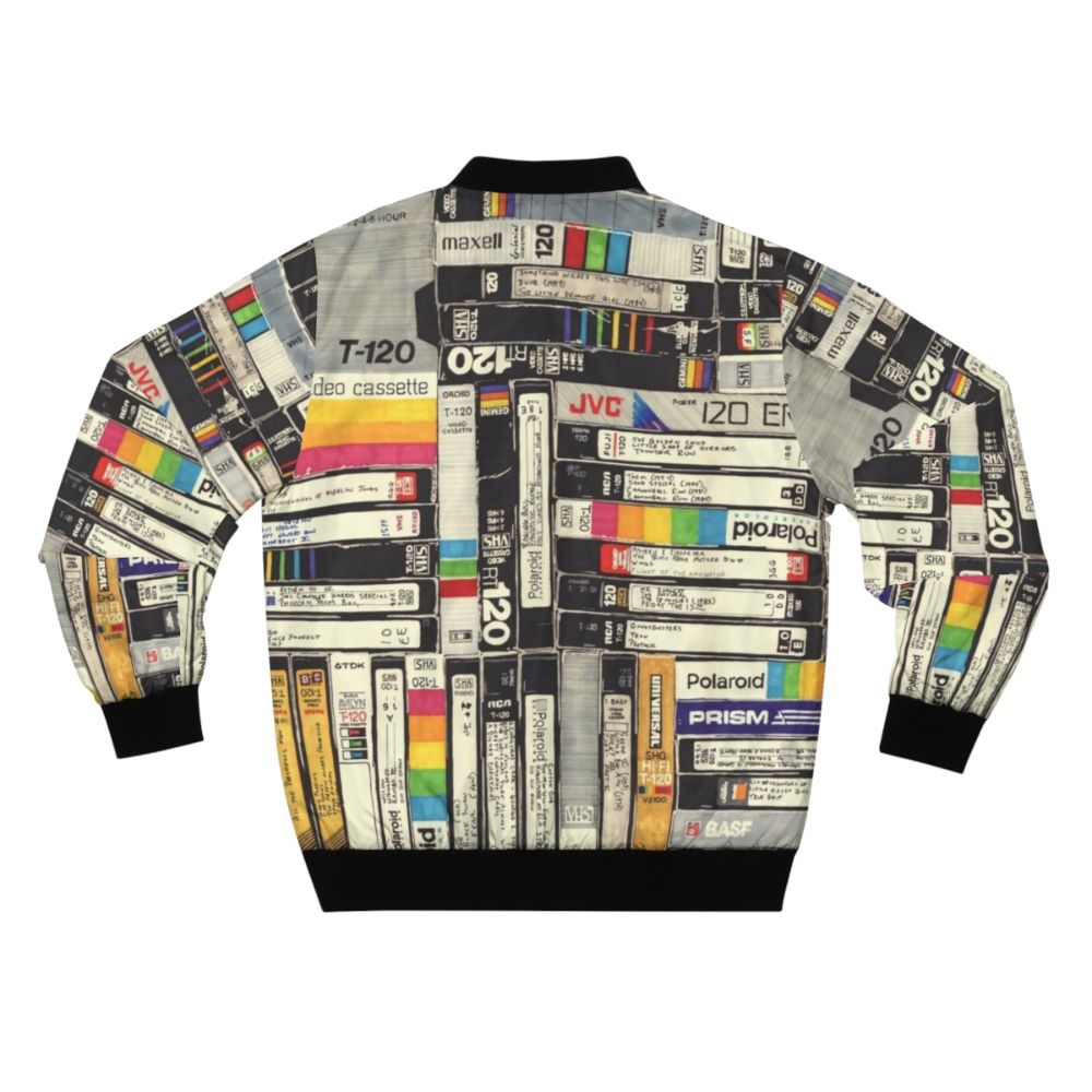 Colorful bomber jacket with VHS, permanent marker, and retro pop culture inspired graphics and patterns - Back