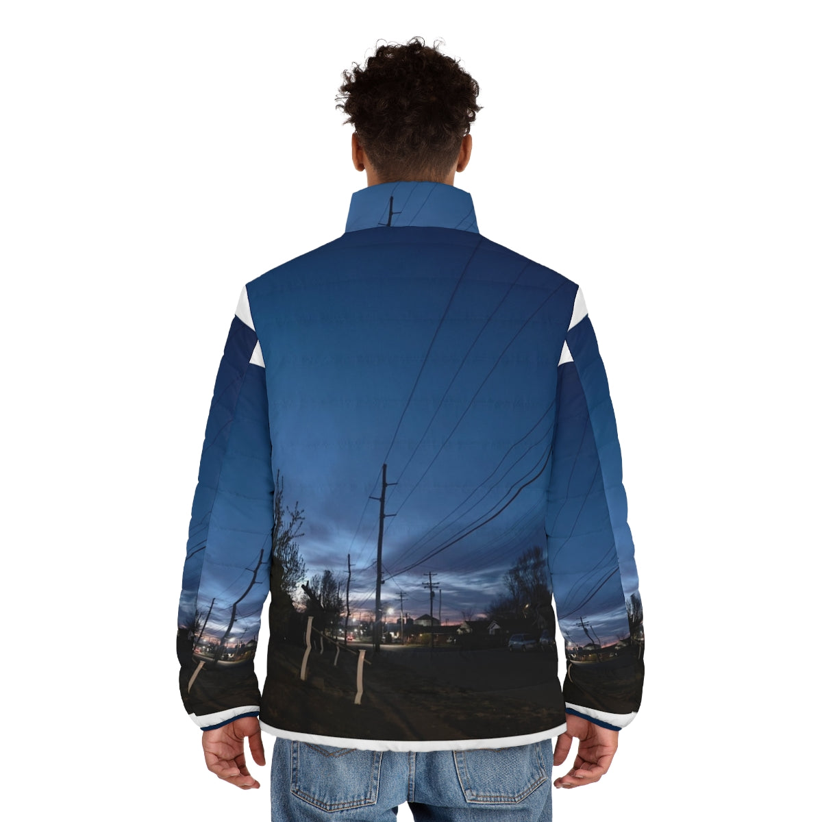 A person wearing a warm and stylish winter puffer jacket against a sunrise sky - men back