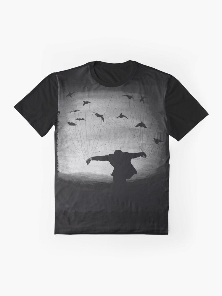 A t-shirt featuring a striking silhouette of ravens flying against a cloudy, mysterious background. - Flat lay