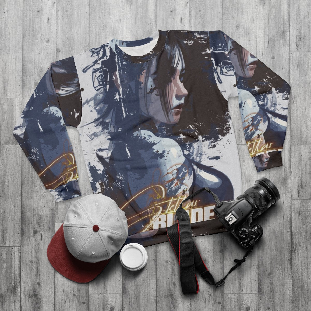 Stellar Blade character fanart on a grey sweatshirt - flat lay