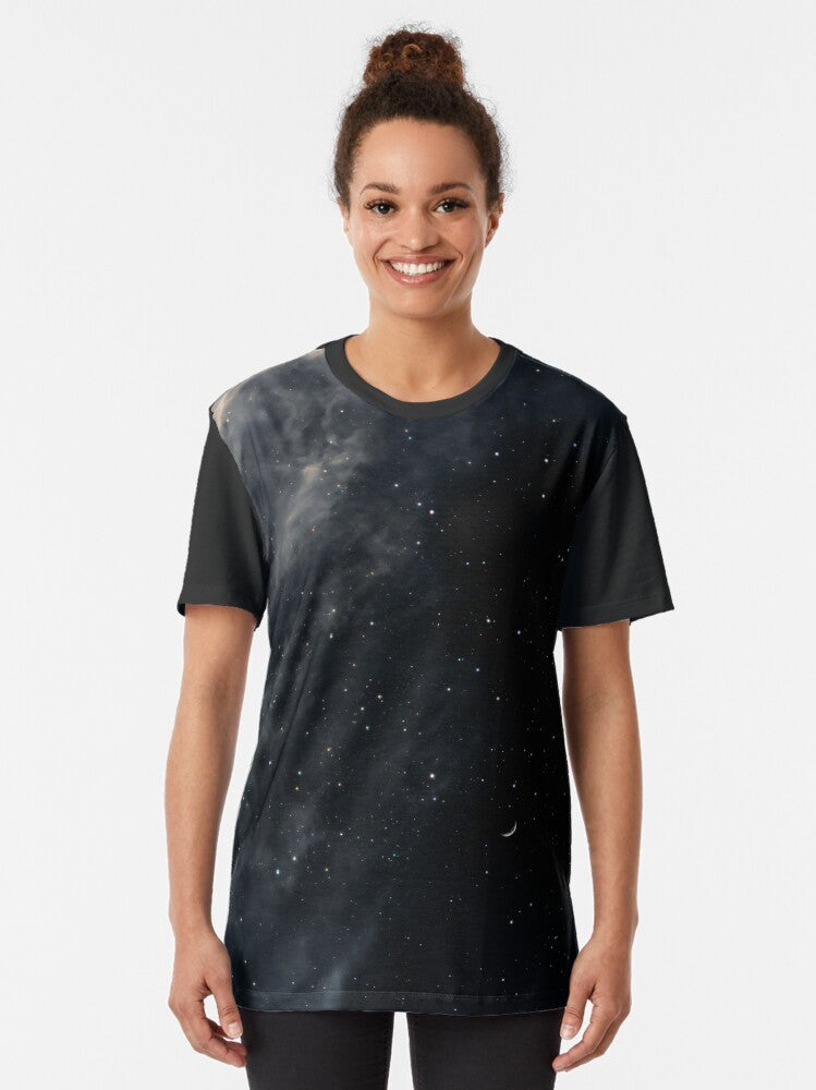 Melancholy landscape graphic t-shirt featuring a night sky with the moon, stars, and a dark, moody scene - Women