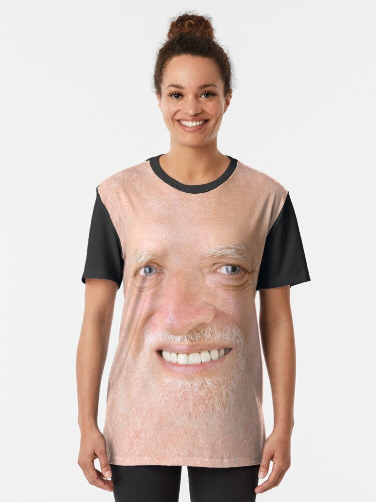 A graphic t-shirt featuring the "Hide The Pain Harold" meme, a popular internet meme of an older man smiling awkwardly. - Women