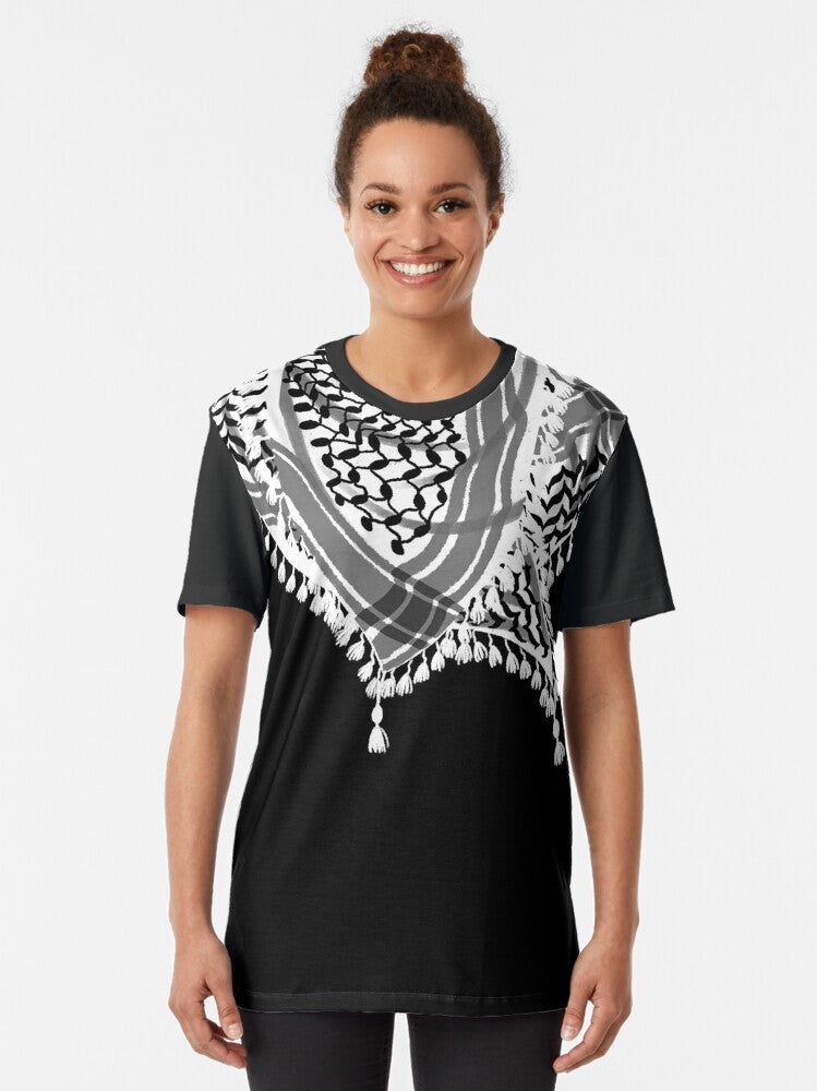 Keffiyeh scarf graphic t-shirt with black and white waves, fishnet, and tassels, featuring a Palestinian pattern design - Women