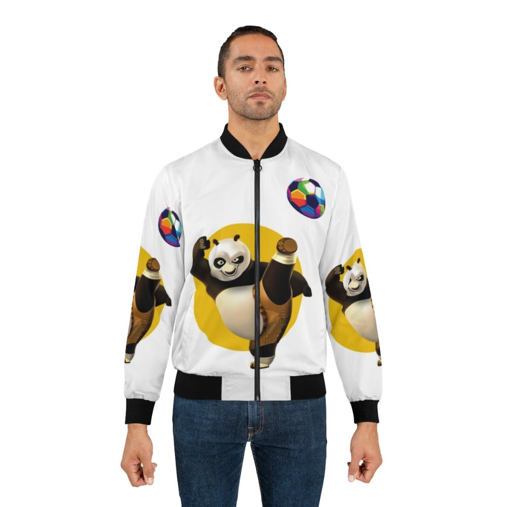 A colorful and cute bomber jacket featuring a panda playing soccer in a space-themed design. - Lifestyle