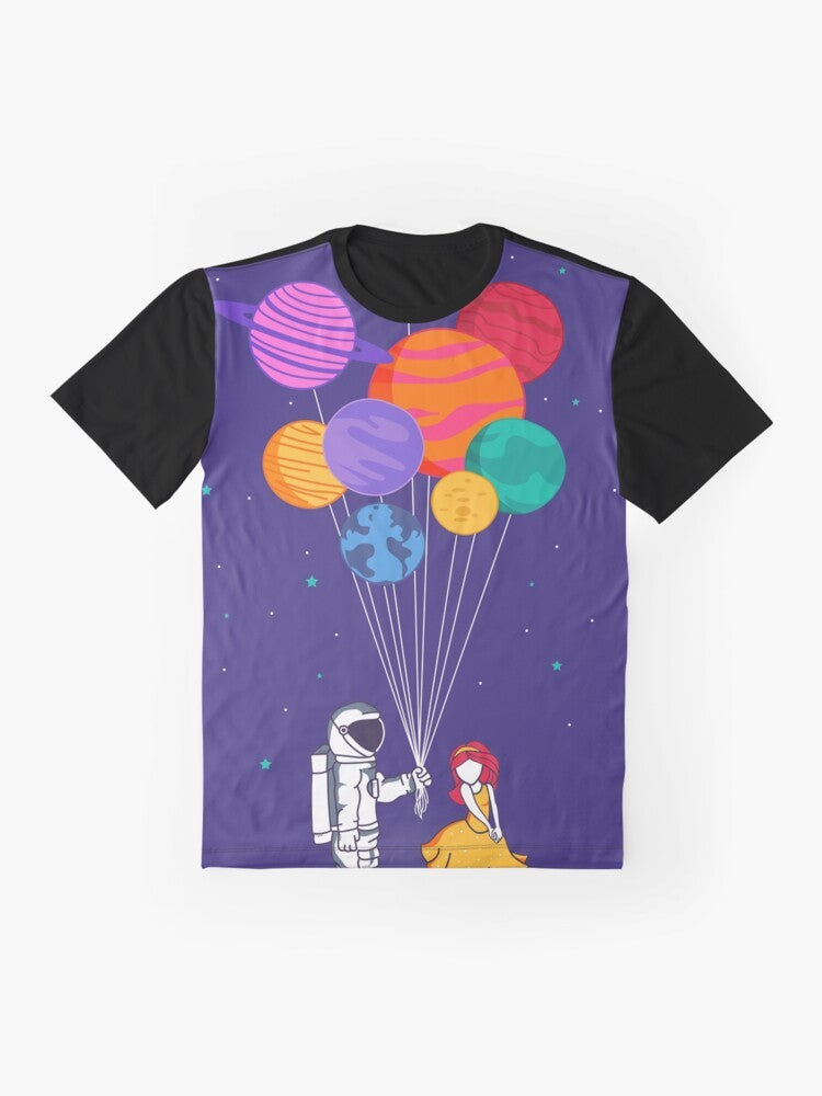 Graphic t-shirt featuring a couple in space with planets, stars, and a galaxy in the background - Flat lay