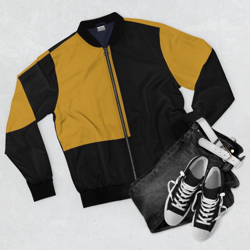 A stylish bomber jacket featuring a graphic design of Billy the Kid and a teddy bear. - Flat lay