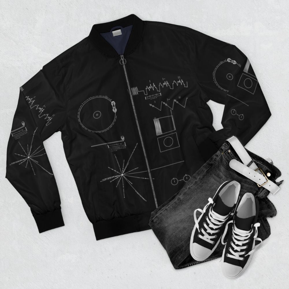 Voyager Golden Record bomber jacket with abstract space and astronomy designs - Flat lay